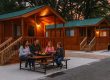 Family enjoying a glamping cabin vacation at Stony Fork Creek Campground in Pennsylvania