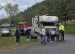 Family camping with their dog at Stony Fork Creek Campground in Pennsylvania